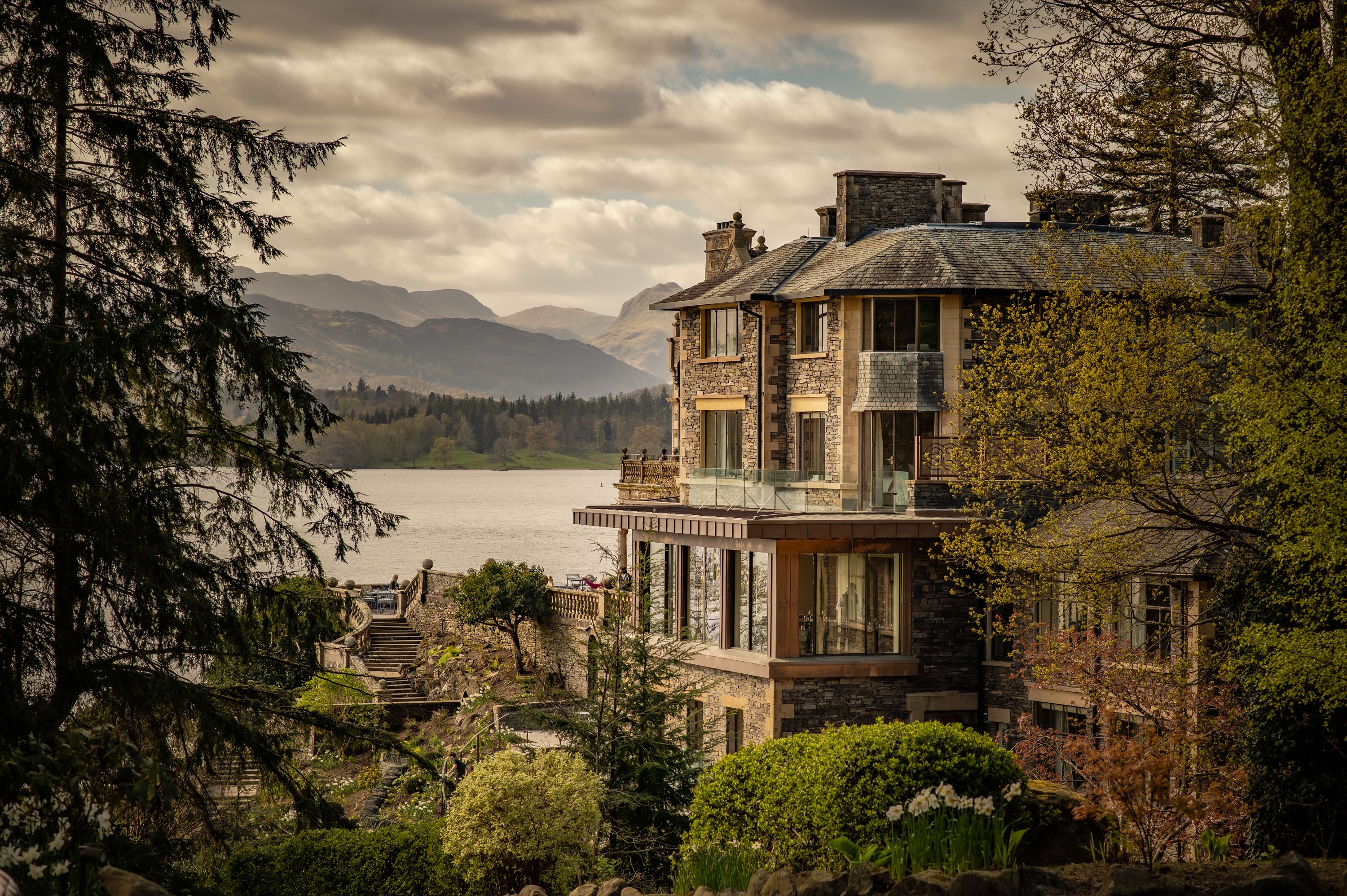 exterior of langdale chase with lake windemere in the background