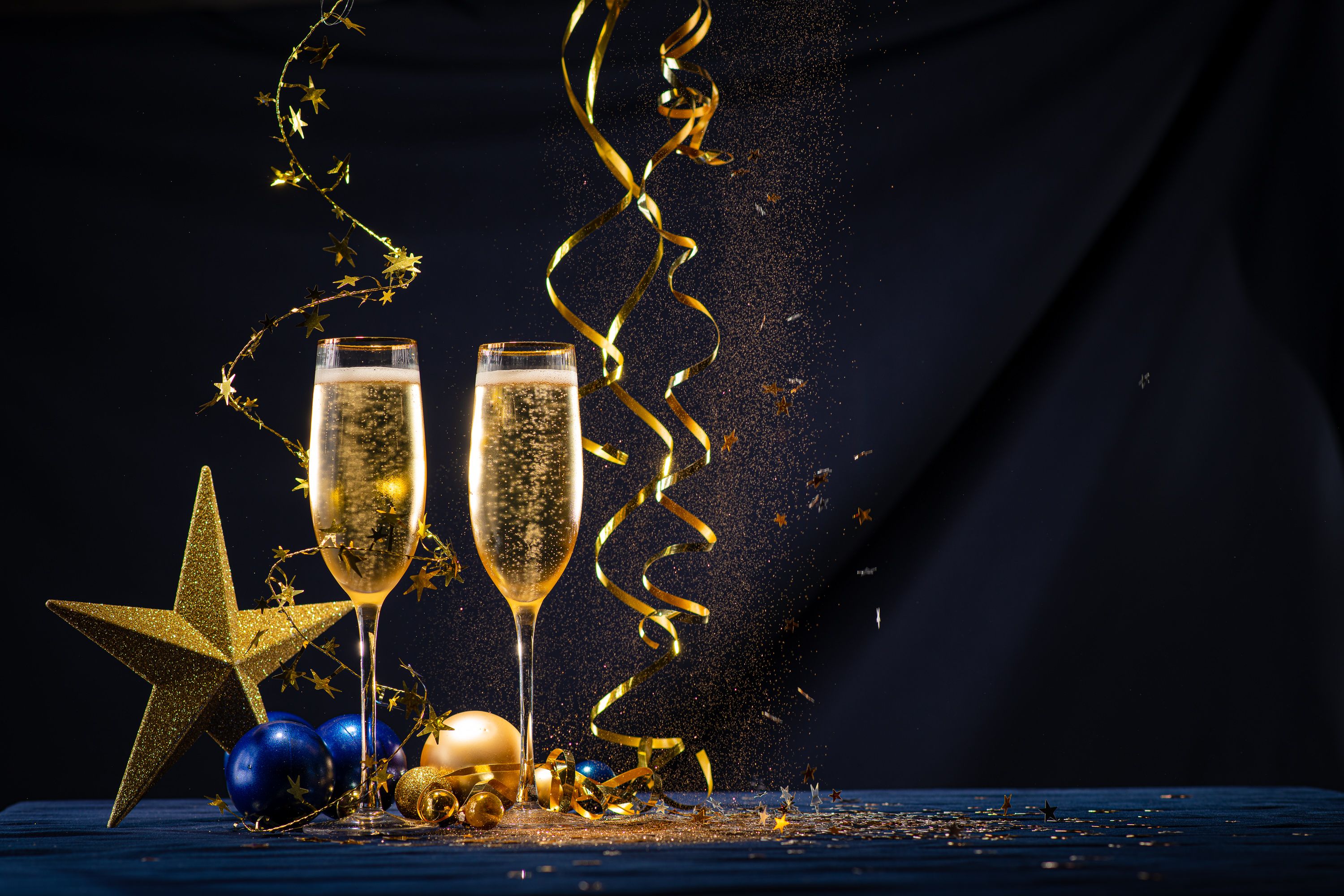 Champagne glasses with Christmas decorations